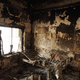 The remains of a bed frame in a room in the eastern wing of the main outpatient department building.